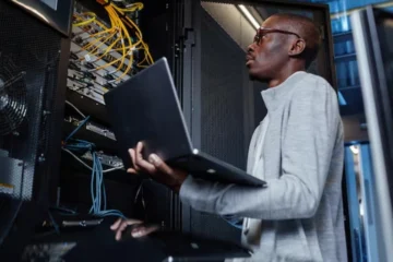Image of an ICT technician performing upgrades